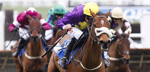 11.03.2015 - Cheltenham; Windsor Park ridden by Davy Russell (yellow cap) wins the Neptune Investment Management Novices Hurdle (Registered As Baring Bingham Novices Hurdle) Grade 1. Credit: Lajos-Eric Balogh/turfstock.com