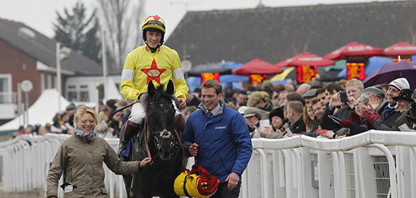 11.03.2015 - Cheltenham; Winners presentation with Aux Ptits Soins ridden by Sam Twiston-Davies after winning the Coral Cup (Handicap Hurdle) Grade 3. Credit: Lajos-Eric Balogh/turfstock.com