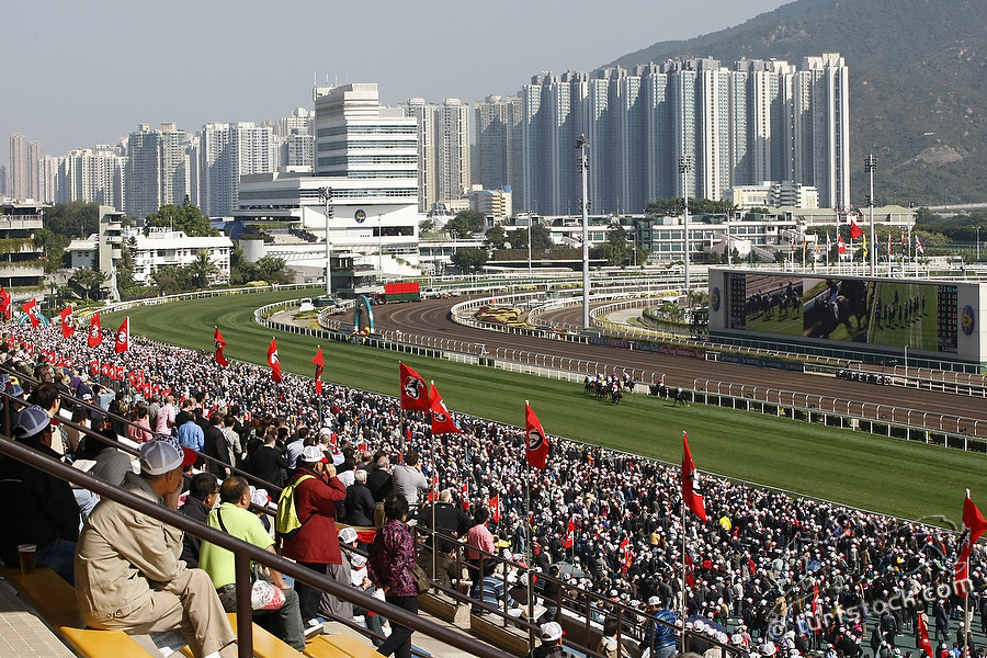 11. Dec. 2011 - Sha Tin Racecourse; Impressions: Racegoers enjoy the races at Sha Tin Racecourse in front of the skyscrapers. Credit: Lajos-Eric Balogh/turfstock.com