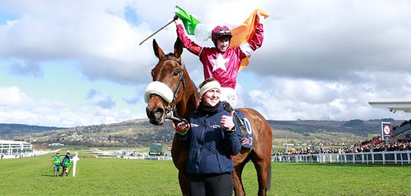 15.03.2018 - Cheltenham; Winners presentation with a irish flag holding jockey Jack Kennedy after winning the JLT Novices Chase (Registered As The Golden Miller Novices Chase) Grade 1 with Shattered Love at Cheltenham-Racecourse/Great Britain. Credit: Lajos-Eric Balogh/turfstock.com